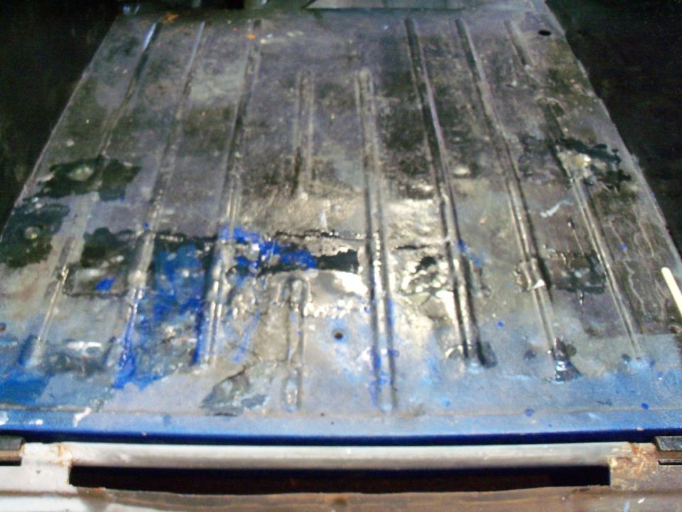 1978 Jeep CJ5 interior floor with rust and repairs