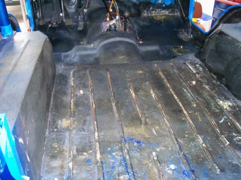 1978 Jeep CJ5 - The interior of a 1978 Jeep CJ5, revealing the floor and dashboard area.