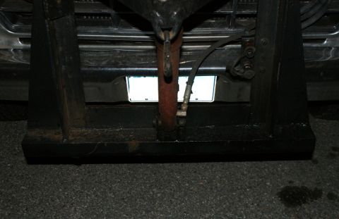 1979 Ford Bronco - A heavy-duty plow mount is attached to the rear of a vehicle, obscuring most of the truck's details.