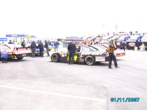 1978 Ford Bronco - Multiple NASCAR race cars are lined up with crew members around them, with a date stamp of 01/11/2007.
