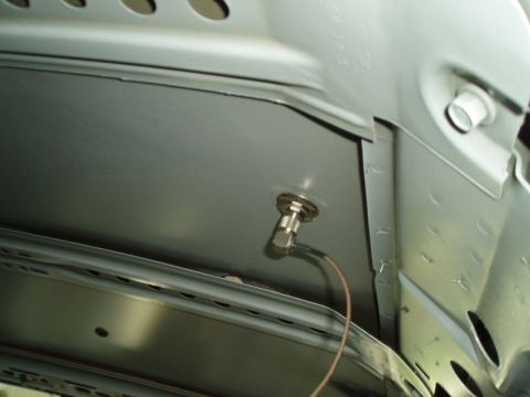 2003 Ford Crown Victoria - Mounted from the bottom, this cord is hidden until it comes up the carpet though the powerseat wiring cut, under the driver seat to be used…