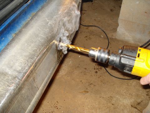 1985 Ford F-150 - Drilling into a vehicle's bumper creates smoke.
