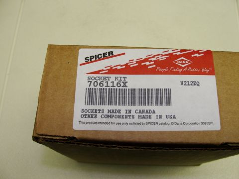 1995 Ford Bronco - A cardboard box with a label for a Spicer socket kit, part number 706116X.