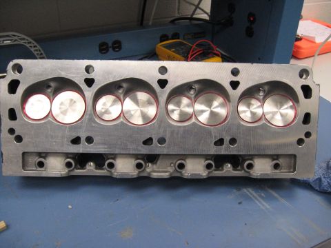 2008 Ford F-250 - Close-up of an engine cylinder head, showing the intake and exhaust valve ports.