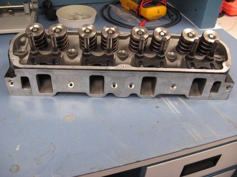 2008 Ford F-250 - A close-up view of an engine cylinder head, showing the valves and springs in detail.