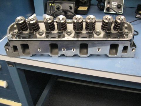 2008 Ford F-250 - Close-up of an engine cylinder head, showing its internal components and metal construction.