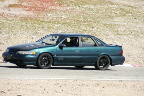 1995 Ford Taurus - A modified 1995 Ford Taurus is seen on the track during a racing event.