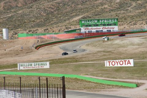 1995 Ford Taurus - Willow Springs International Raceway features a Budweiser Balcony and a Toyota billboard with cars on the track.