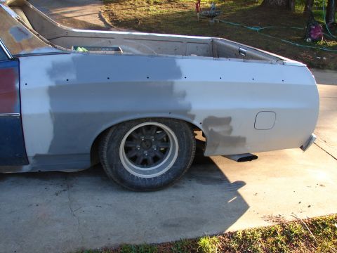 1973 Ford Ranchero - This 1973 Ford Ranchero shows extensive bodywork on its rear quarter panel, indicating a restoration project.