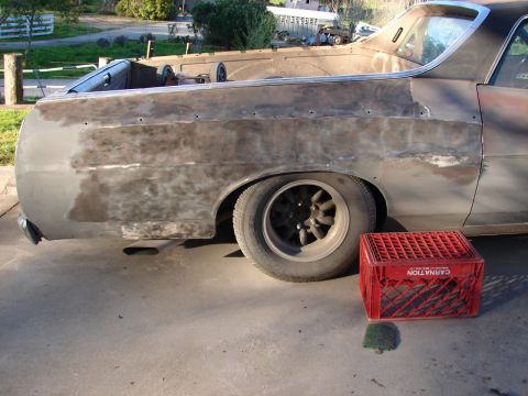 1973 Ford Ranchero - A 1972 Ford Ranchero is shown in bare metal, undergoing bodywork.