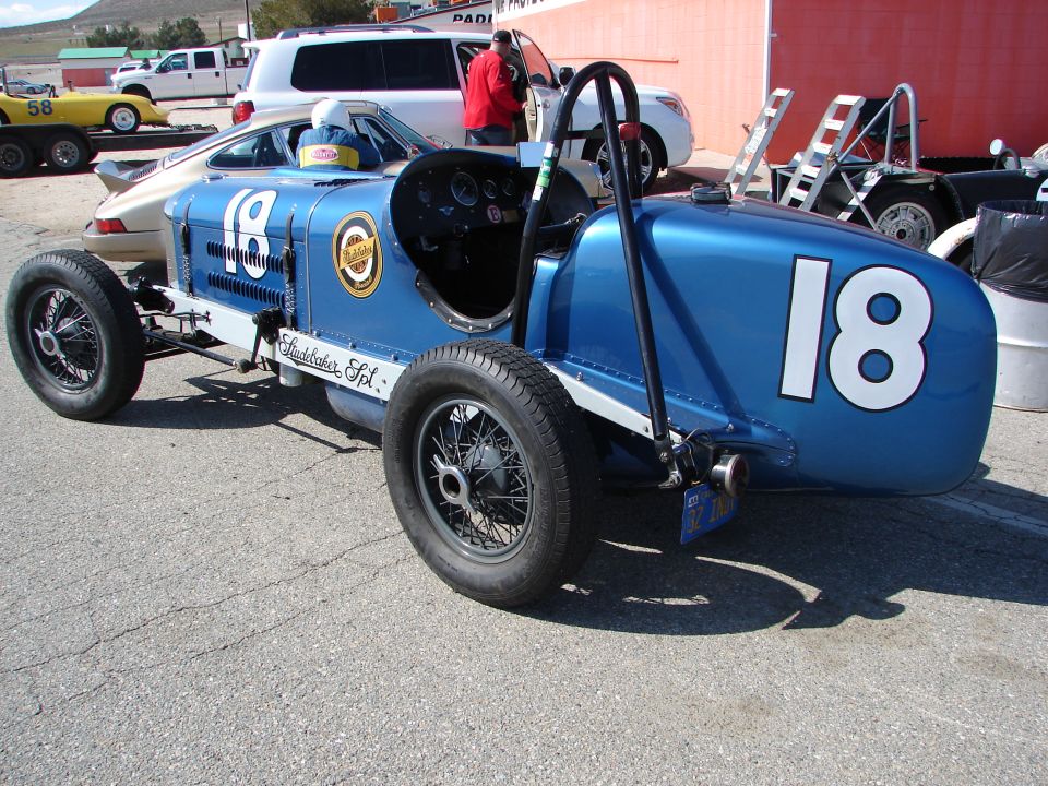 Blue race car with number 18 and 'Studebaker Spl.' text