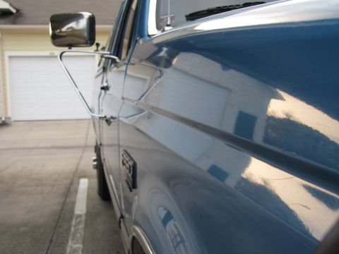 1993 Ford F-250 - Side view of a blue 1993 Ford F-250 pickup truck.