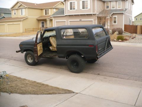 1979 Ford Bronco - This 1978 Ford Bronco is parked on the street in front of a suburban house.