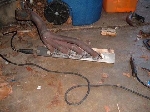 1981 Ford LTD - I drilled and tapped a 1"x3"x24" piece of cold rolled steel to bolt the flange to while welding. It really worked. The flange was about 1/8…