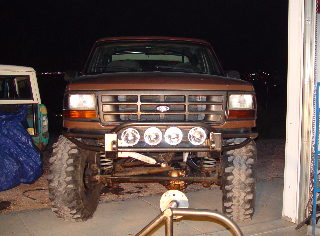 1993 Ford Bronco - Front view of a modified 1992 Ford Bronco, with another Bronco visible to the left.