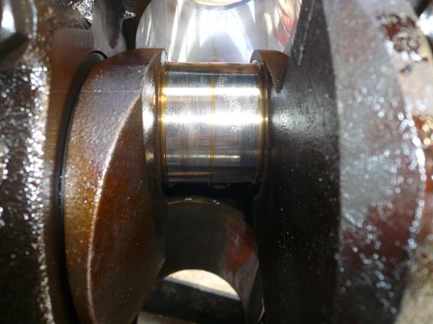 1975 Ford Ranchero - This image shows a close-up view of a crankshaft bearing, highlighting its condition.