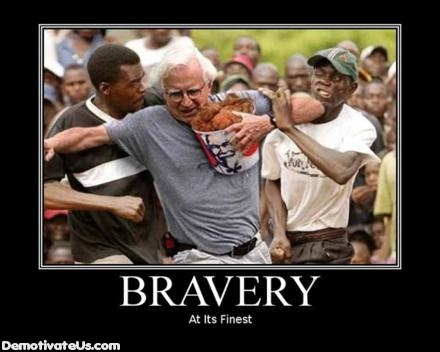 1989 Ford Bronco - A man is being restrained by two individuals while clutching a bucket of fried chicken.