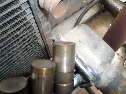 1975 Ford Ranchero - Close-up view of engine lifters and radiator fins.