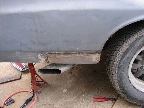 1973 Ford Ranchero - A 1973 Ford Ranchero undergoes bodywork, focusing on the lower side panel repair and exhaust system.