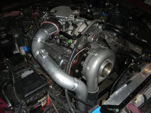 1992 Ford Crown Victoria - Custom engine build a turbocharger and extensive intercooler piping, likely for performance enhancement.