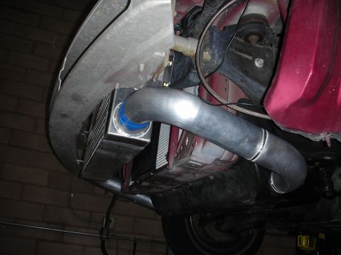 1992 Ford Crown Victoria - Custom intercooler and piping installed on a vehicle, likely for performance enhancement.