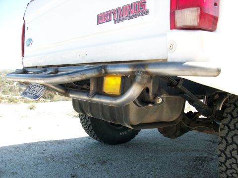 1996 Ford Bronco - Rear view of a 1996 Ford Bronco showing a custom bumper and fuel tank.