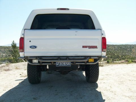 1996 Ford Bronco - This 1996 Ford Bronco is equipped with a custom rear bumper and off-road tires, ready for adventure.