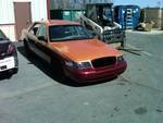 1999 Ford Crown Victoria - Front view of a 1999 Ford Crown Victoria with custom two-tone paint job.