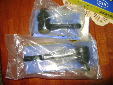 1998 Ford Crown Victoria - New tie rod ends are packaged for sale, with branding visible on one of the boxes.