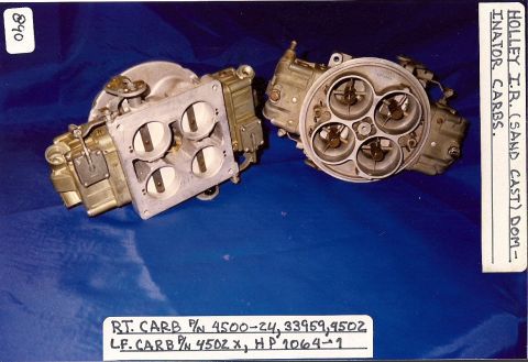 1973 Ford Mustang - Two Holley carburetors are displayed, identified by part numbers and text on labels.