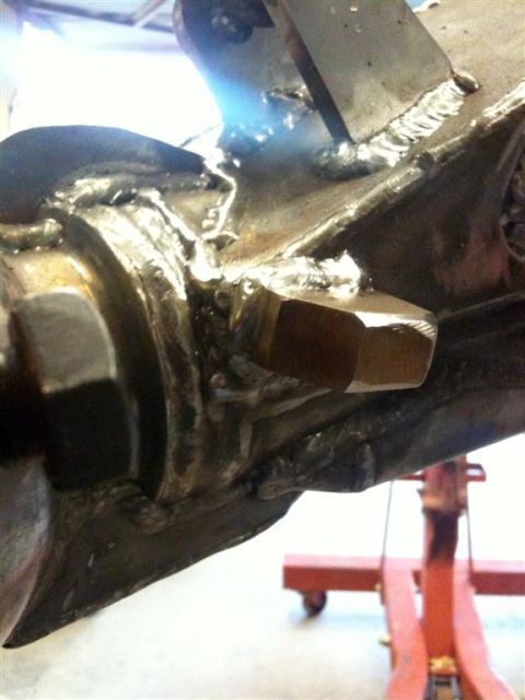 Suzuki Samurai - Axle housing showing recent welding work and a prominent hex nut.