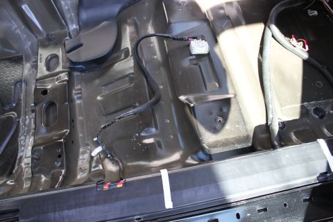 2007 Ford Crown Victoria - install the powerseat wiring harness though the black wiring runner, make sure you have enough to stick out to make your connection to the…