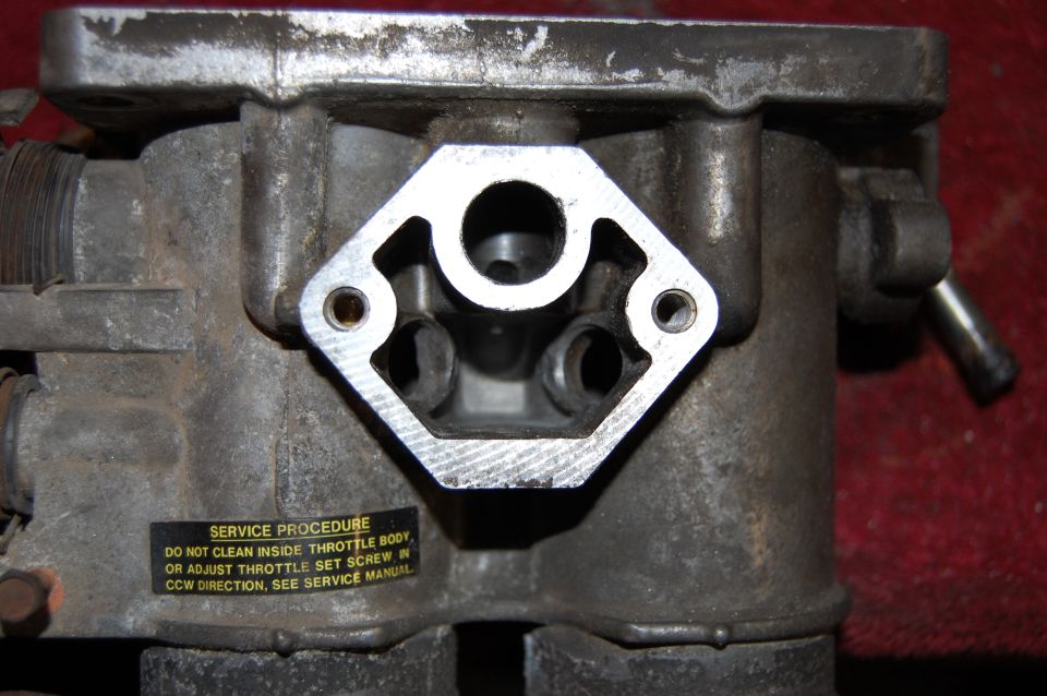 Throttle body with service procedure label