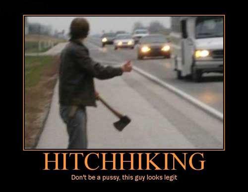 Man with an axe hitchhiking on a road with cars in the background