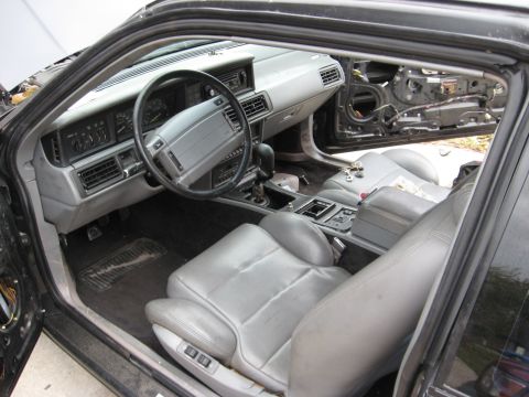 1990 Lincoln Mark VII - Interior view of a 1990 Lincoln Mark VII with the driver's side door panel removed.