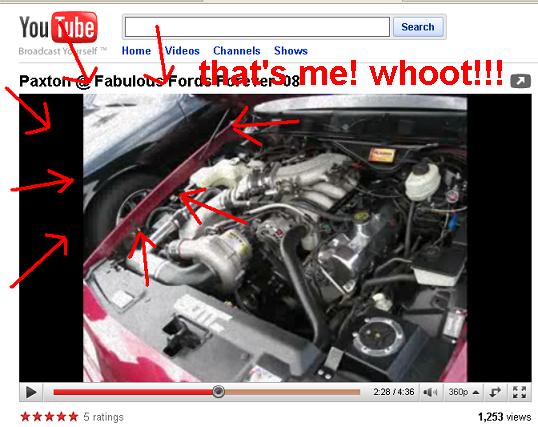 YouTube screenshot showing a car engine bay with red arrows pointing to various parts. Text overlay says 'that's me! whoot!!!'