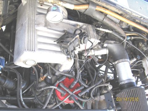 1994 Ford Bronco - Close-up view of an engine bay, showing various components and wiring, with a timestamp in the corner.
