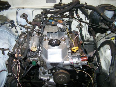 1988 Suzuki Samurai - Close-up view of a Toyota engine bay, showing various components and wiring.