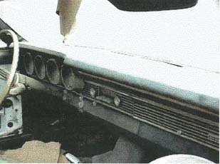 1967 Mercury Cyclone - Interior view of a car's dashboard, showing gauges and vents. A website logo is present.