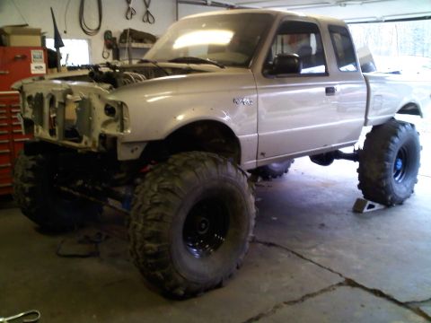 1997 Ford Ranger - This modified 1997 Ford Ranger features an extreme lift and oversized tires, giving it a formidable stance.