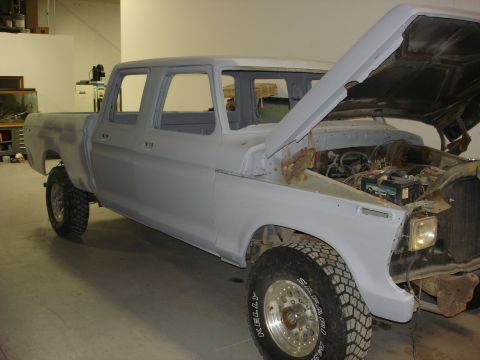 1979 Ford F-250 - This crew cab pickup truck appears to be from the 1970s, likely a Ford F-Series, but not a 1979 model.