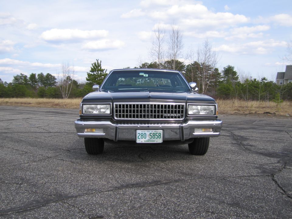 Black sedan front view, license plate 280 5858