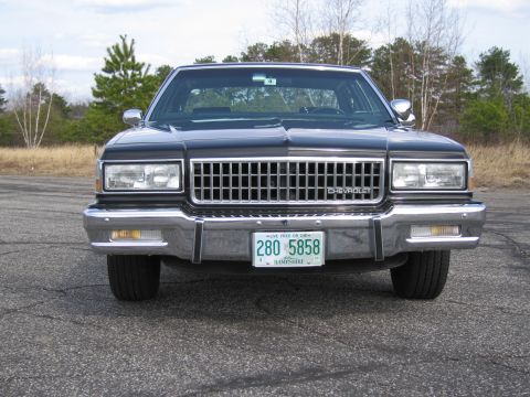 1991 Ford LTD Crown Victoria - This Chevrolet Caprice features a distinctive chrome grille and a New Hampshire license plate.
