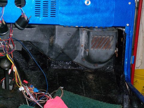 1978 Jeep CJ5 - Exposed wiring and heater assembly in a Jeep's interior.