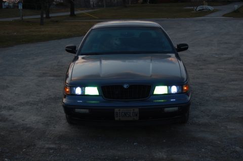 1985 Mercury Grand Marquis - Frontal view of a Mercury Grand Marquis, showing its grille and headlights.
