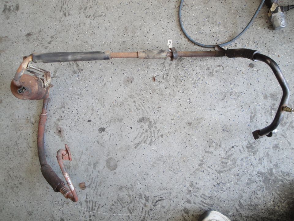 exhaust pipe assembly with muffler and sensor