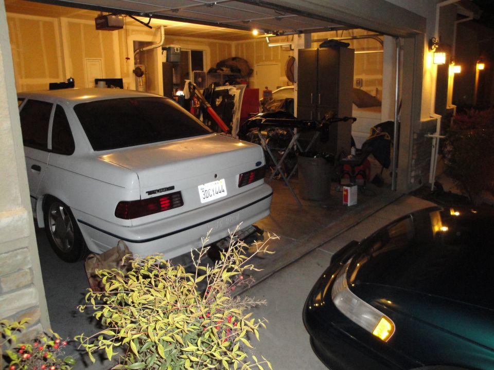 White 1989 Ford Taurus sedan rear view with California plates