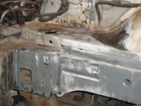 1989 Ford Taurus - This image shows damage and repair work on a car's frame, not a complete vehicle.