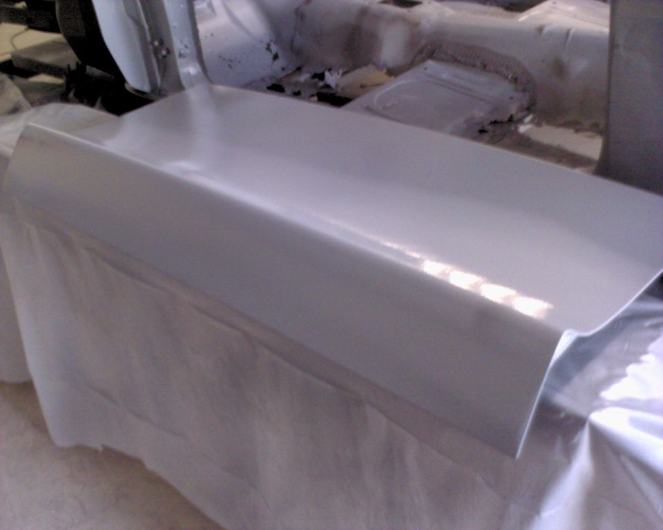trunk lid is a new reproduction piece.