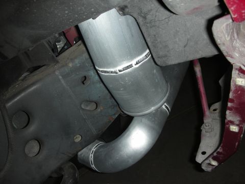 1992 Ford Crown Victoria - Custom exhaust piping with clean welds is installed on the underside of a vehicle.